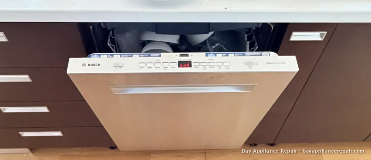 Bosch built-in dishwasher with a stainless front panel, door slightly open