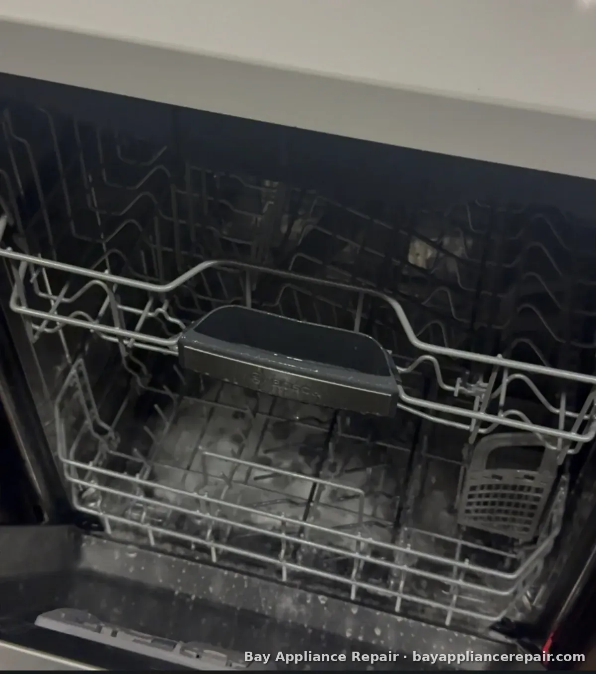 Bosch dishwasher interior with upper and lower racks