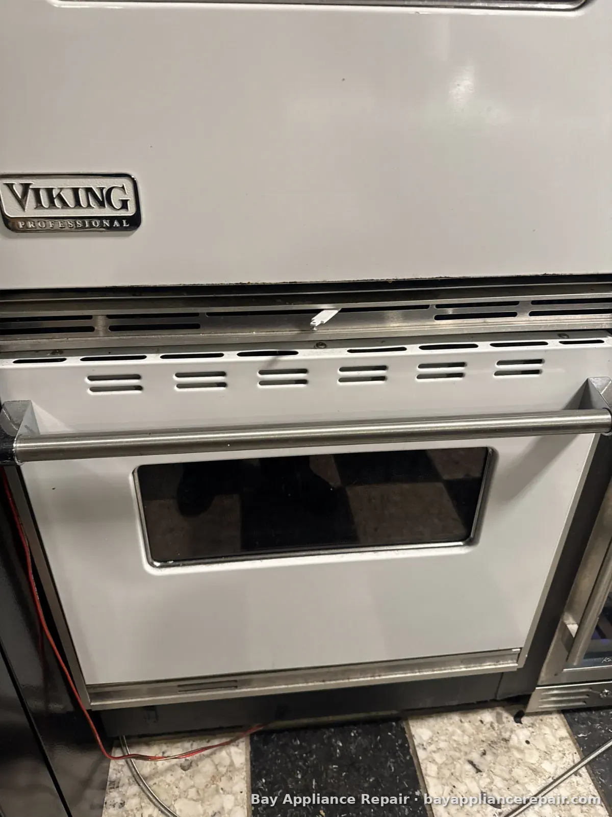 Viking Professional double wall oven pulled out of the cabinet for service